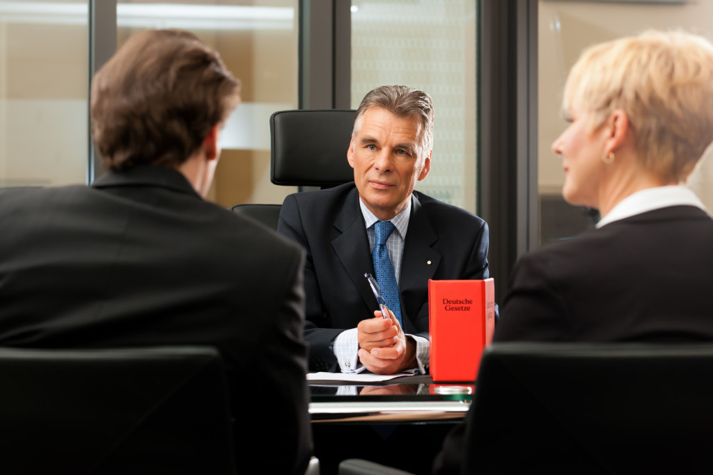 business owners consulting with a lawyer